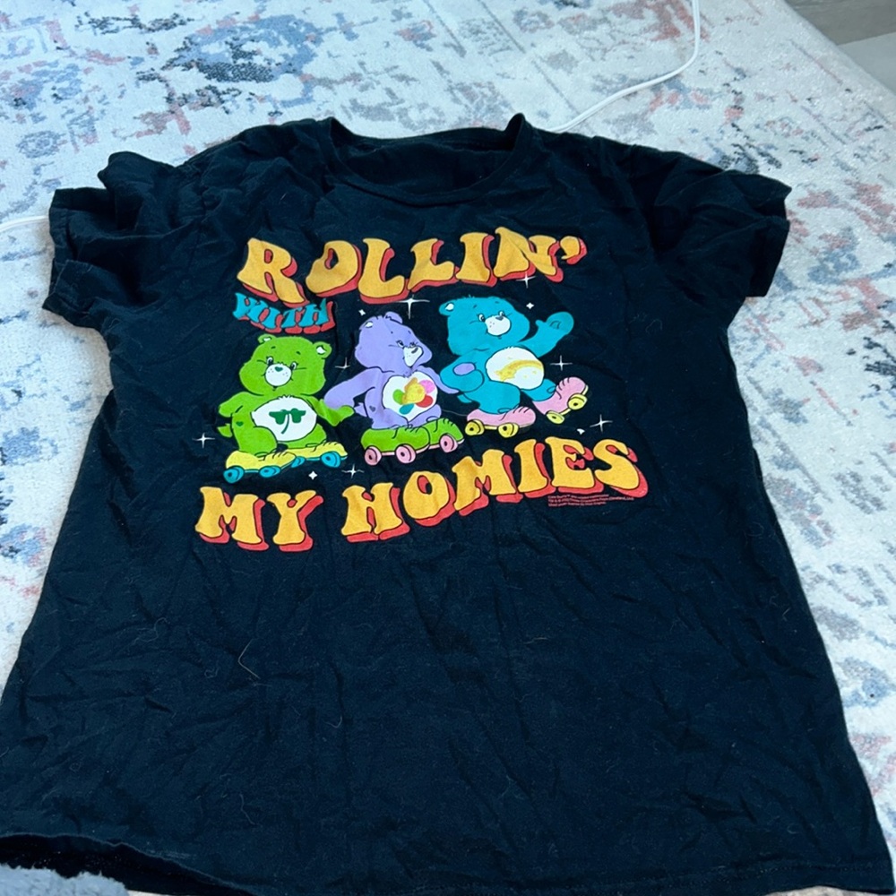 Carebear T-shirt.  Size small tag is missing but put measurements in pictures